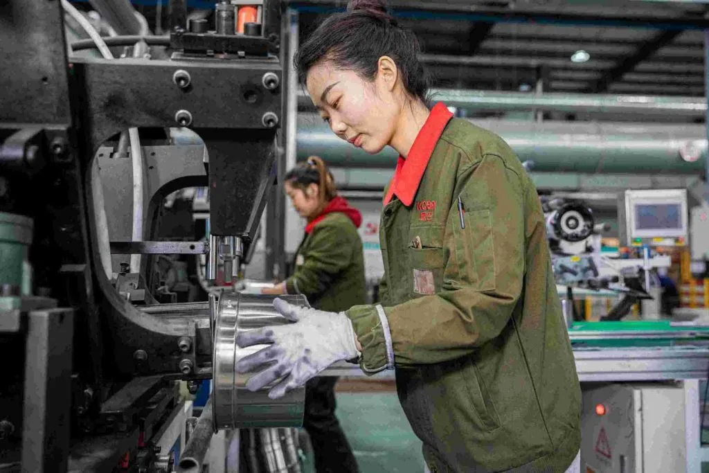 Handle riveting - stainless steel cookware manufacturing process 9