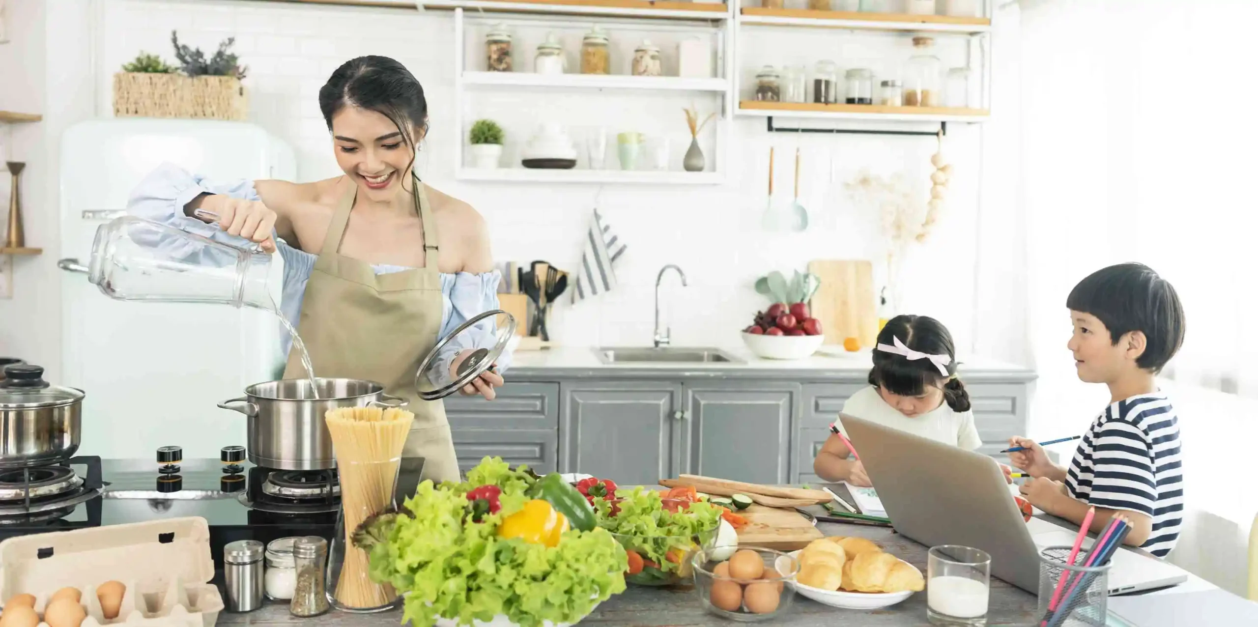 Stainless Steel cookware cooking in Open Kitchen